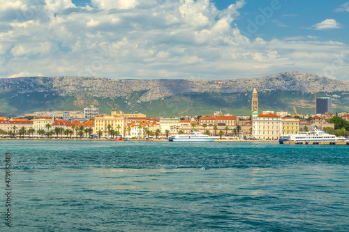 View from the sea on the historic center of Split with mountains in the background, Croatia, Europe.