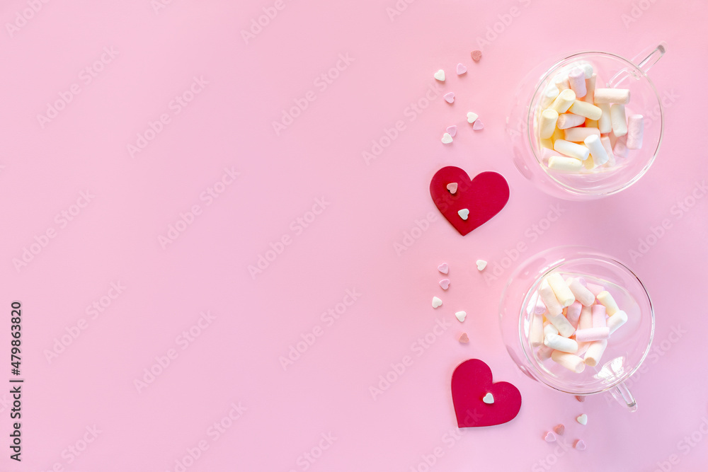 two cups full of marshmallow, hearts shaped, colorful red white pink sprinkles, sweet confetti, decoration for valentine day, womens day, copy space mock up, love background