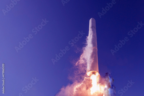 Take off space rocket on a background of blue sky and sun. Elements of this image were furnished by NASA