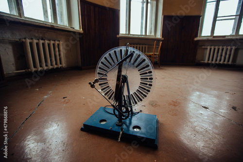 Old electrostatic machine, Wimshurst generator in abandoned school photo