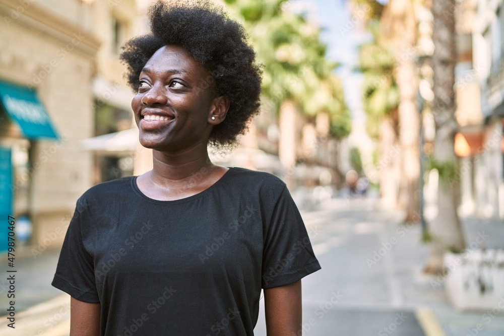 Young african woman smiling confident at street Young african woman smiling confident at street