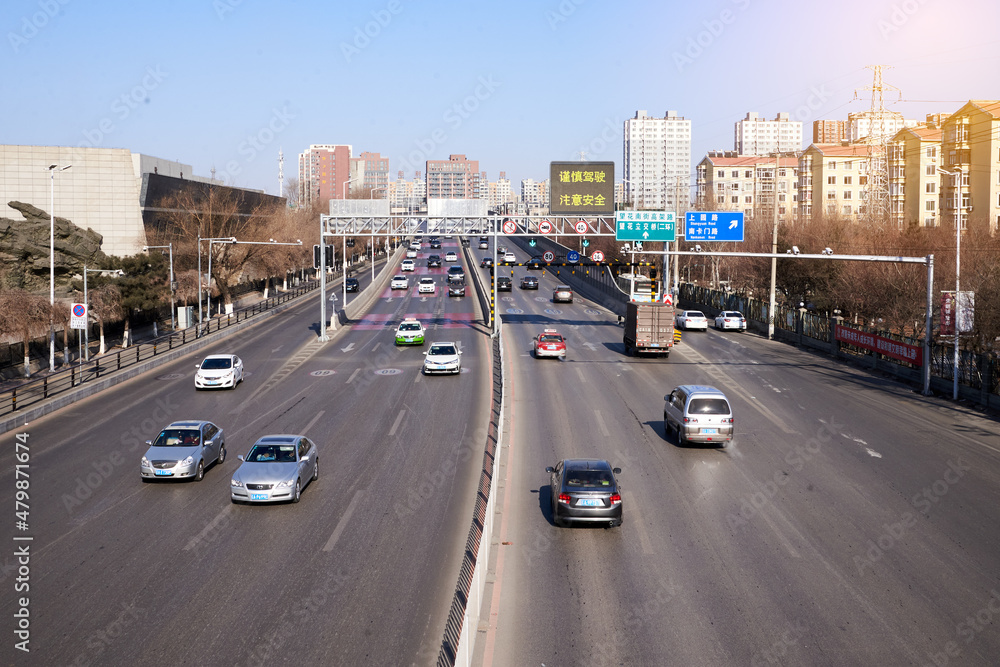 Fototapeta premium Fast vehicles in Chinese highway during sunny day