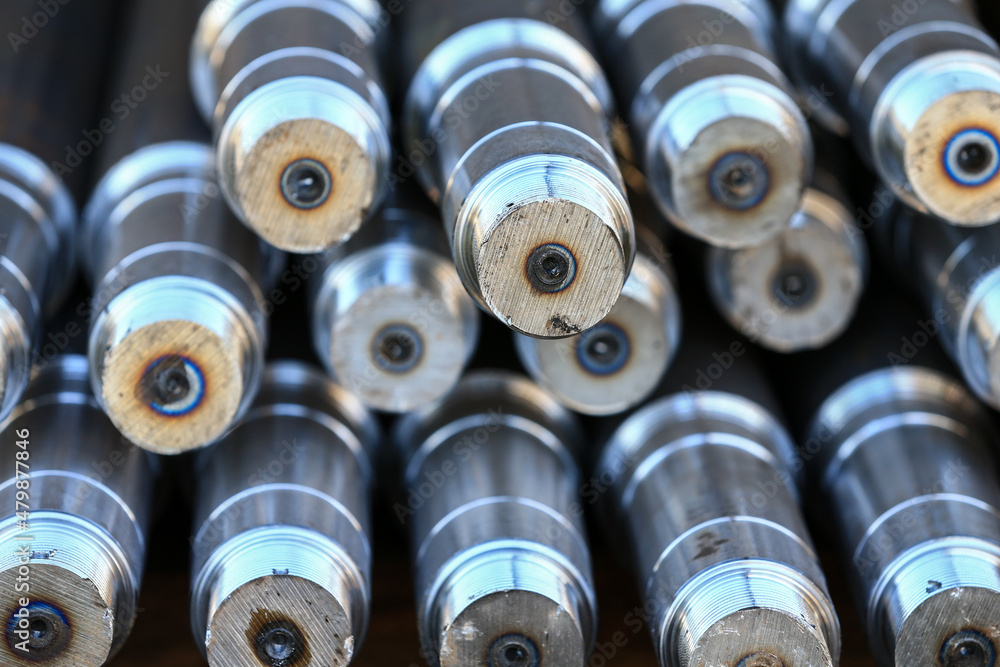 Many axles are stacked together