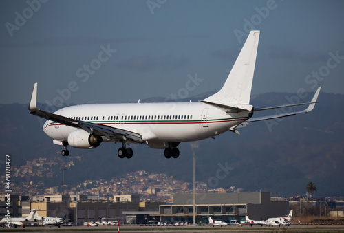 View of passenger airplane landing in El Prat Airport, Barcelona