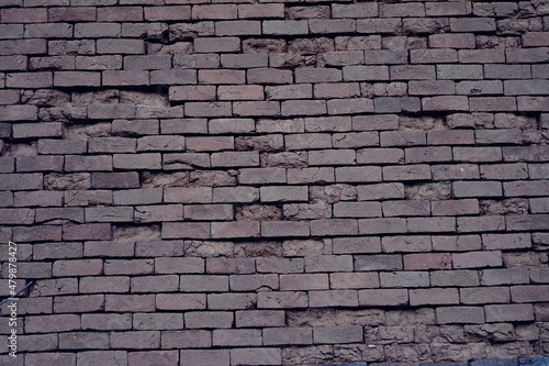 Old demolished brick wall