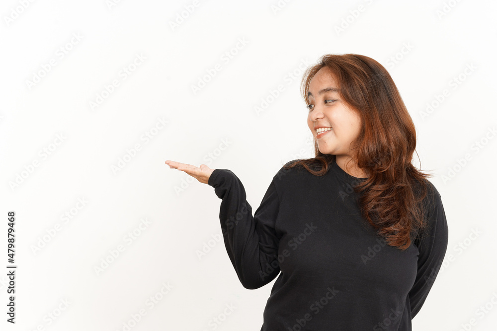 Showing and Presenting recommend product on open palm Of Beautiful Asian Woman Wearing Black Shirt Showing and Presenting recommend product on open palm Of Beautiful Asian Woman Wearing Black Shirt