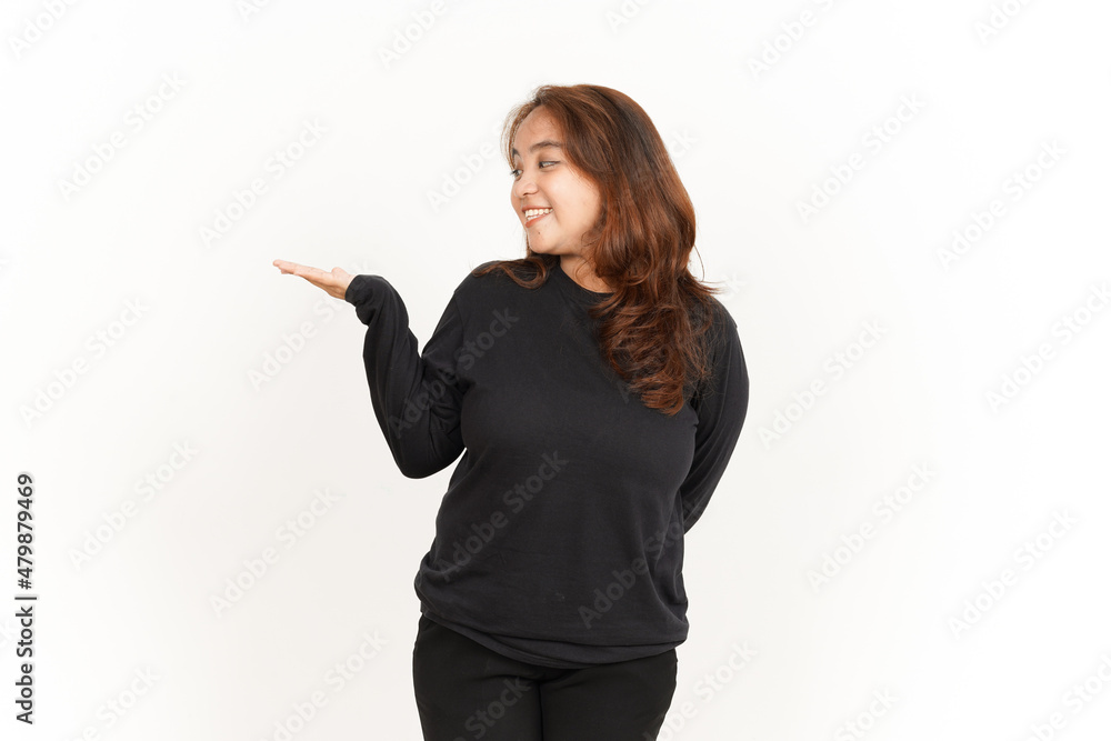 Showing and Presenting recommend product on open palm Of Beautiful Asian Woman Wearing Black Shirt Showing and Presenting recommend product on open palm Of Beautiful Asian Woman Wearing Black Shirt