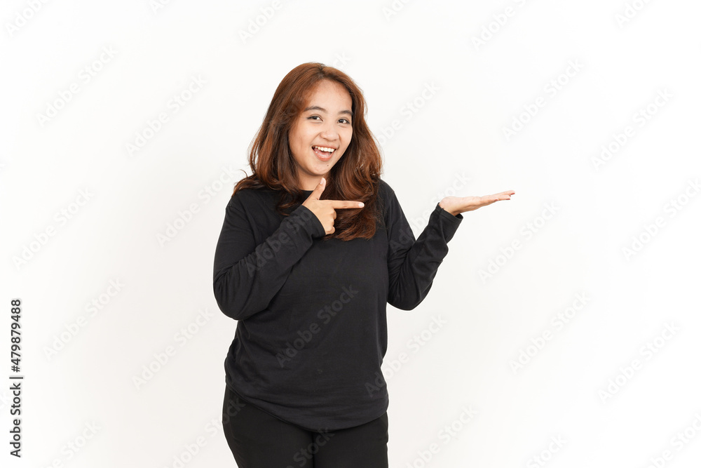 Showing and Presenting recommend product on open palm Of Beautiful Asian Woman Wearing Black Shirt Showing and Presenting recommend product on open palm Of Beautiful Asian Woman Wearing Black Shirt
