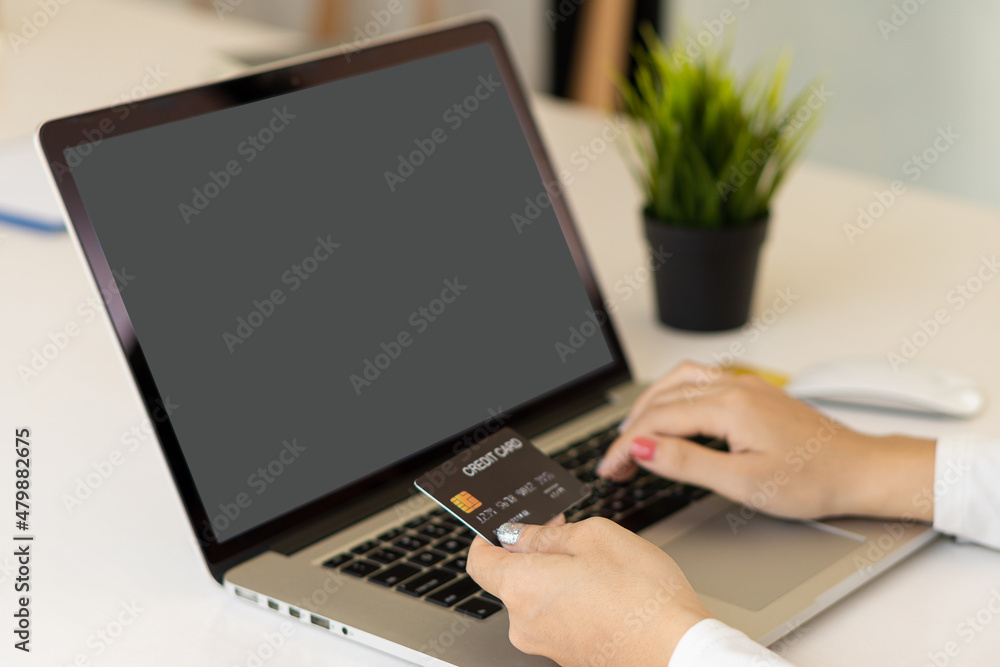 Online shopping concept paying via credit card with laptop computer and smartphone. Online shopping concept paying via credit card with laptop computer and smartphone.