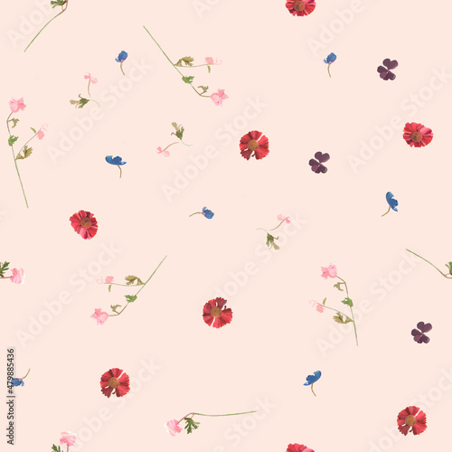Seamless pattern swatch with floral confetti. Great for fabric, textile, wallpaper and wrapping.