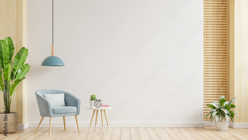 Modern minimalist interior with an armchair on empty white wall