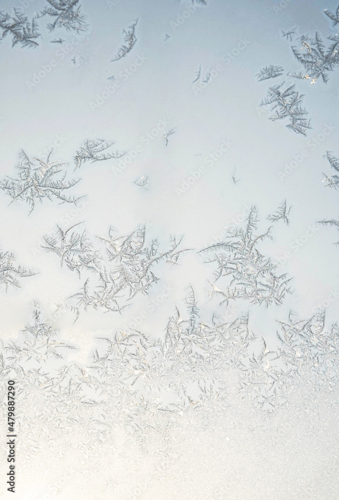 Obraz premium Abstract frost pattern. Frozen noisy window on the cold winter. Texture of ice on window. 