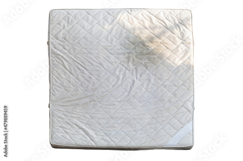 Old mattress is dried in the sun to kill germs isolated on white background included clipping path.