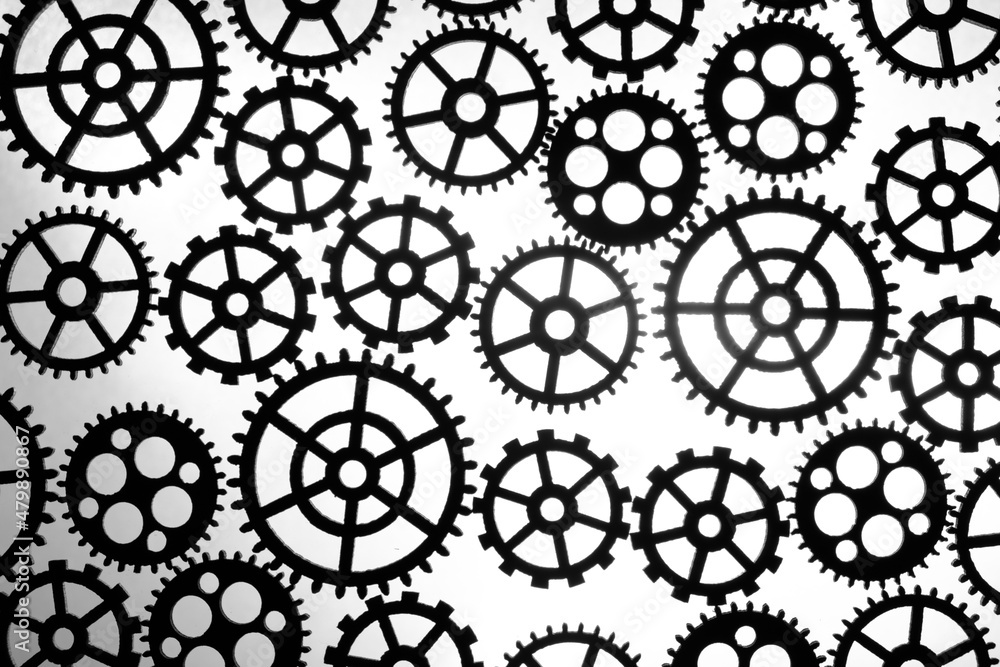 Abstract background black silhouettes, variety gears on white background. Abstract background black silhouettes, variety gears on white background.