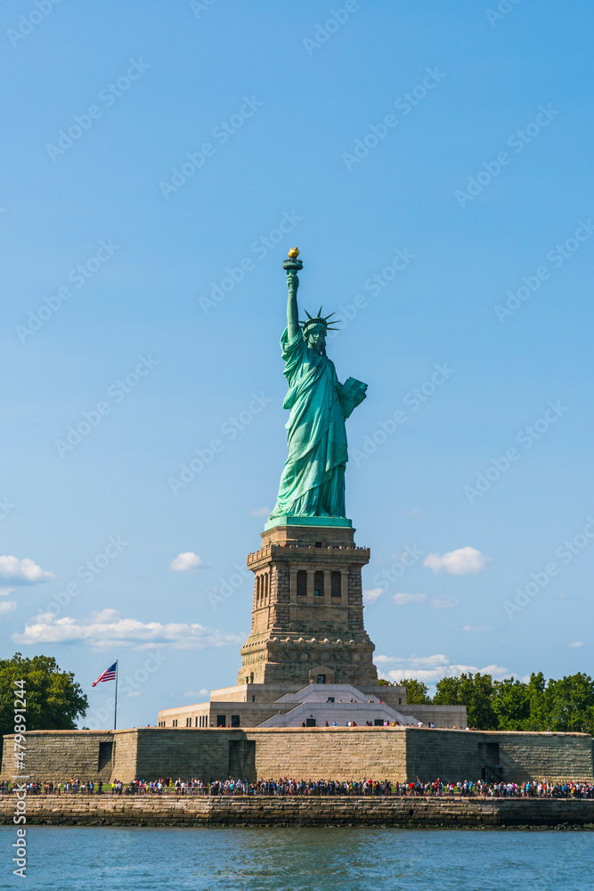 Fototapeta premium The statue of Liberty with blue sky background.
