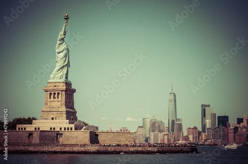 The statue of Liberty  with blue sky background.