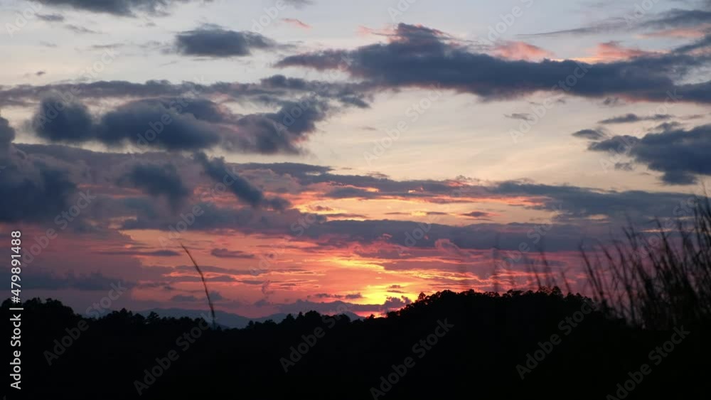 Silhouette of mountain views and a beautiful sunset sky Silhouette of mountain views and a beautiful sunset sky