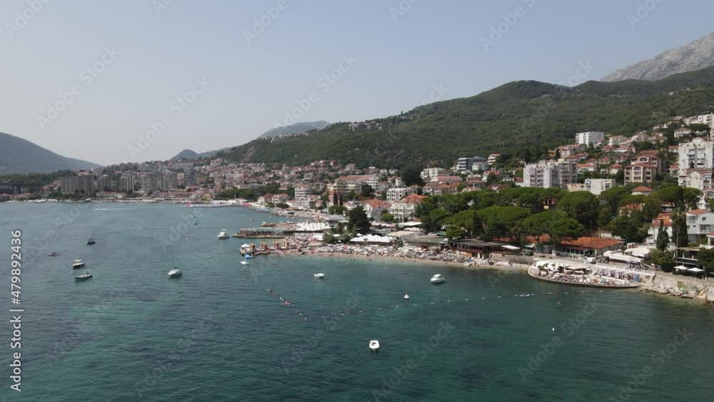 Herceg Novi and Igalo Riviera, Montenegro. Aerial View of Coastline, Beaches and Cityscape on Sunny Summer Day, Drone Shot Herceg Novi and Igalo Riviera, Montenegro. Aerial View of Coastline, Beaches and Cityscape on Sunny Summer Day, Drone Shot