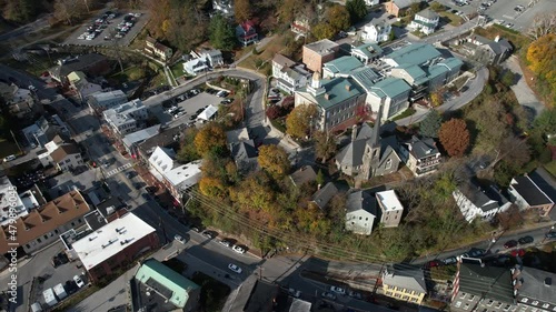 Ellicott City, Maryland USA. Aerial, Howard County History Museum and Courthouse Above Main Street on Sunny Day, Birds Eye Drone Shot photo