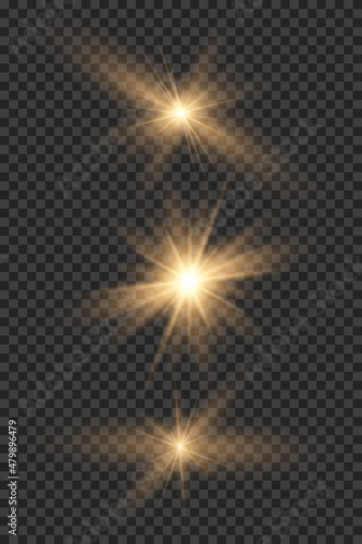 Yellow glowing light explodes on a transparent background. Sparkling magical dust particles. Bright Star. Transparent shining sun  bright flash. Vector sparkles. To center a bright flash