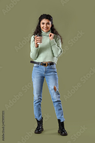 Pretty young woman in warm ...