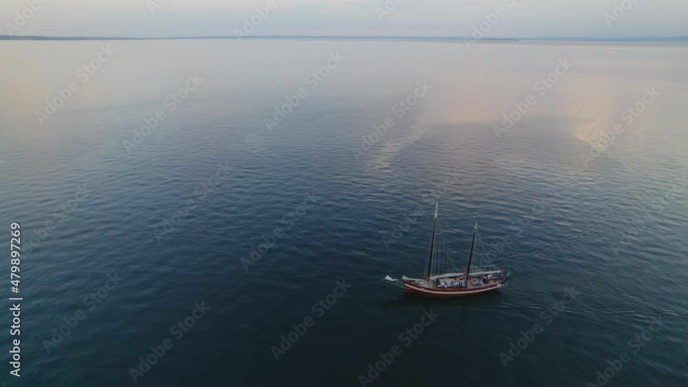 4K drone view of a boat in the lake of Garda 4K drone view of a boat in the lake of Garda