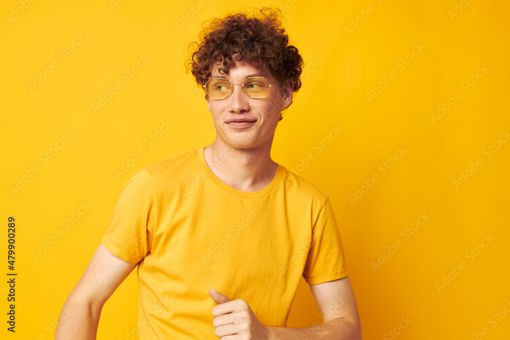 portrait of a young curly man Youth style glasses studio casual wear monochrome shot portrait of a young curly man Youth style glasses studio casual wear monochrome shot