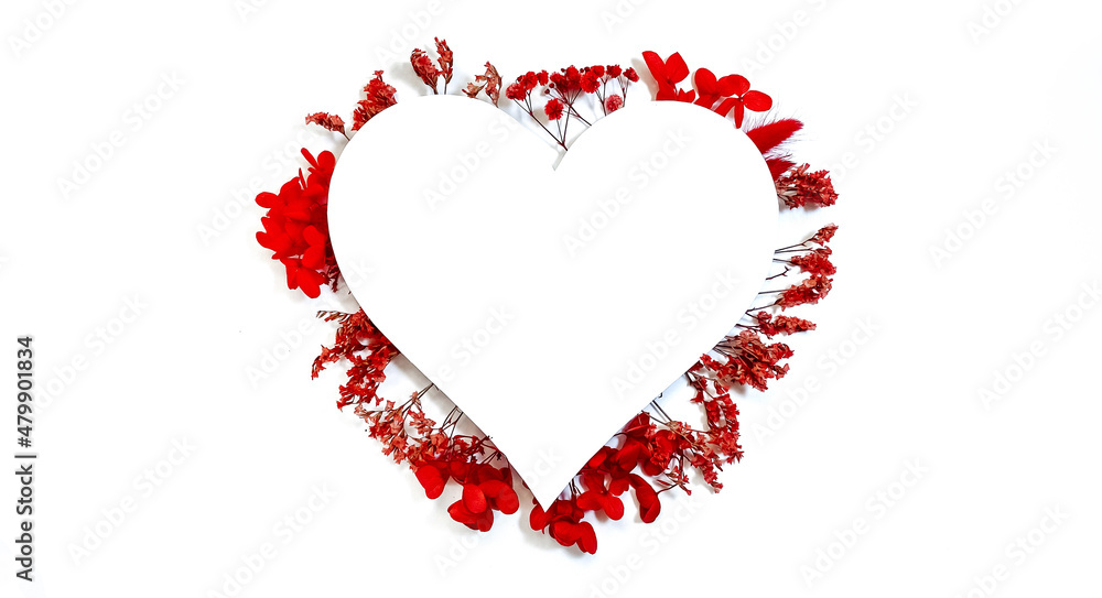 Flowers composition from red flowers in the form of a heart on white background. Spring, summer template for your projects Flowers composition from red flowers in the form of a heart on white background. Spring, summer template for your projects
