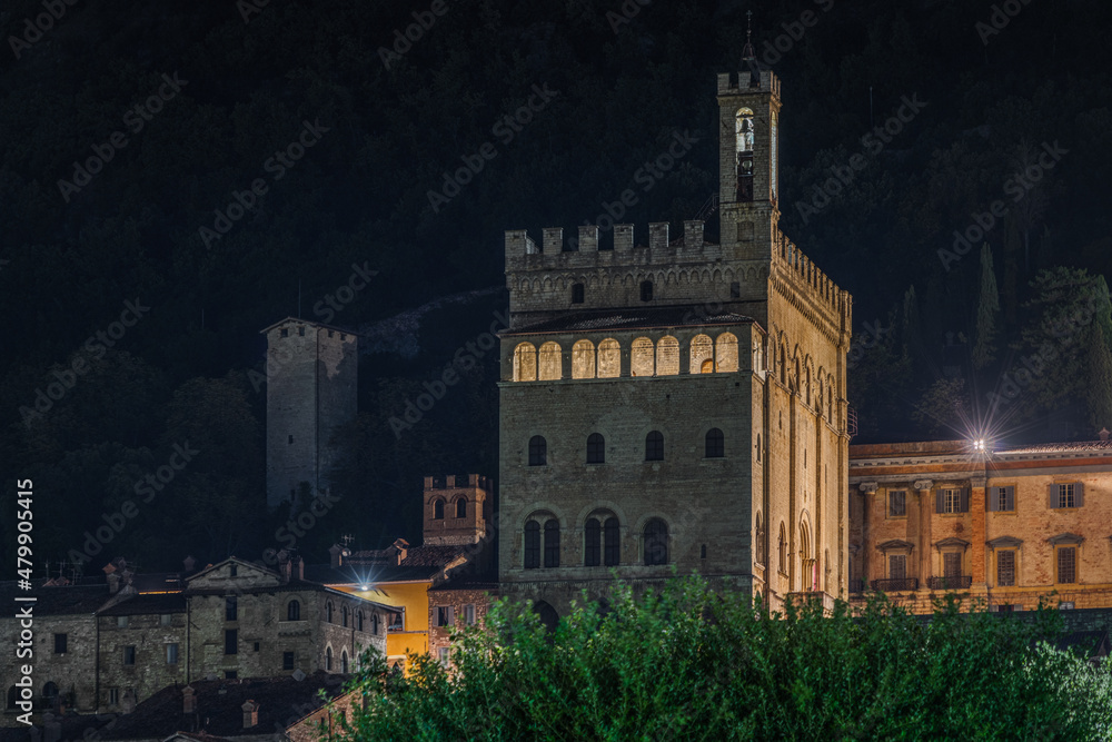 Night view of Palazzo dei Consoli, the main historical landmark of Gubbio, Umbria, Italy