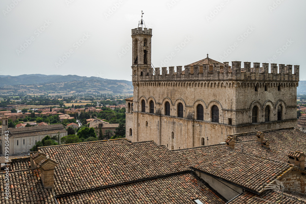 Panoramic view on Gubbio historic center with Palazzo dei Consoli on the right, Umbria, Italy