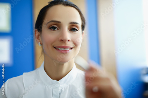 Beautiful office worker female touch virtual screen with silver pen Free Download Beautiful office worker female touch virtual screen with silver pen - GFXLoad
