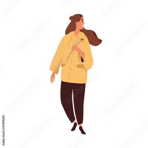 Happy woman walk with spring flower in hand. Relaxed inspired female strollin...