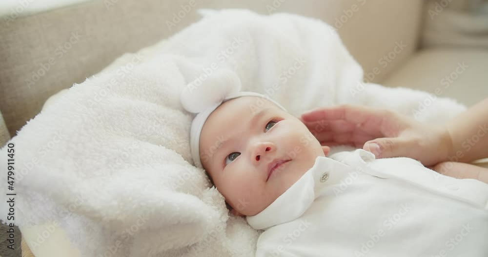 happiness family young Asian mother playing holding kissing with her pretty newborn baby infant girl lying on bed at home, children, parenthood, childhood, life, maternity, motherhood love concept happiness family young Asian mother playing holding kissing with her pretty newborn baby infant girl lying on bed at home, children, parenthood, childhood, life, maternity, motherhood love concept