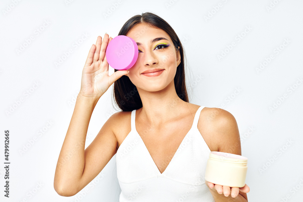 beautiful brunette bright makeup posing skin care isolated background unaltered beautiful brunette bright makeup posing skin care isolated background unaltered