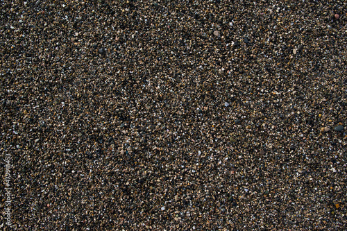 dark pebbles on the seashore