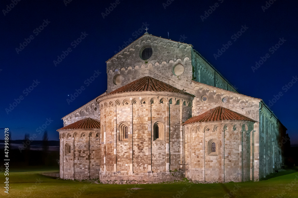 Basilica of St. Peter the Apostle in San Piero a Grado, Pisa, Italy, at dusk