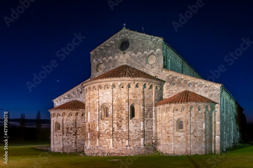 Basilica of St. Peter the Apostle in San Piero a Grado, Pisa, Italy, at dusk
