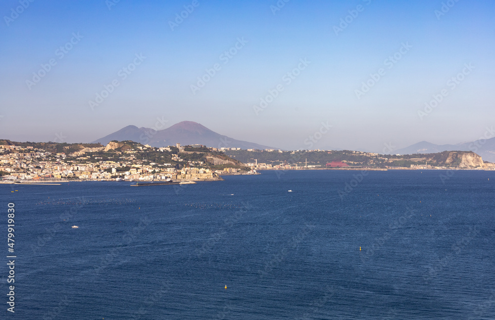 beautiful view of Pozzuoli in the Campi Flegrei with Vesuvius in the background, Naples, Campania, Italy