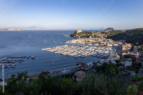 beautiful view of the port of Baia in the Campi Flegrei with Capri island and Sorrento peninsula in the background. Naples, Campania, Italy photo