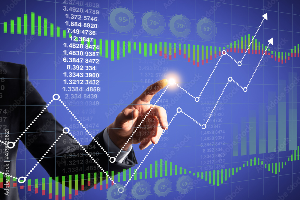 Close up of business man hand pointing at abstract glowing business chart hologram. Finance, trade and technology concept. Double exposure. Close up of business man hand pointing at abstract glowing business chart hologram. Finance, trade and technology concept. Double exposure.