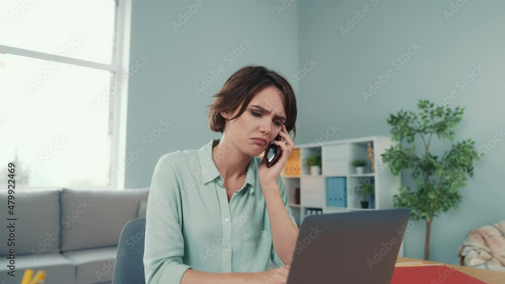 Representative speak device partners write copybook sit table in workplace Representative speak device partners write copybook sit table in workplace