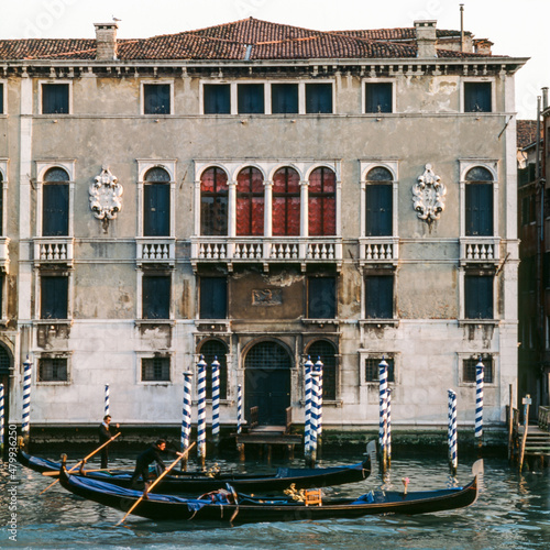 Venezia. Palazzo D'Anna Viaro Martinengo Volpi di Misurata con gondole sul Canal Grande photo