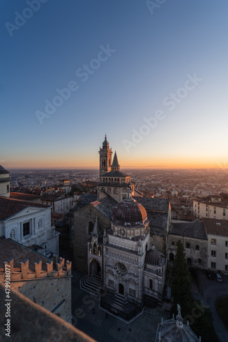 Vertical view of the Basilica of Santa Maria Maggiore in Bergamo Upper City seen from the Campanone at sunset.