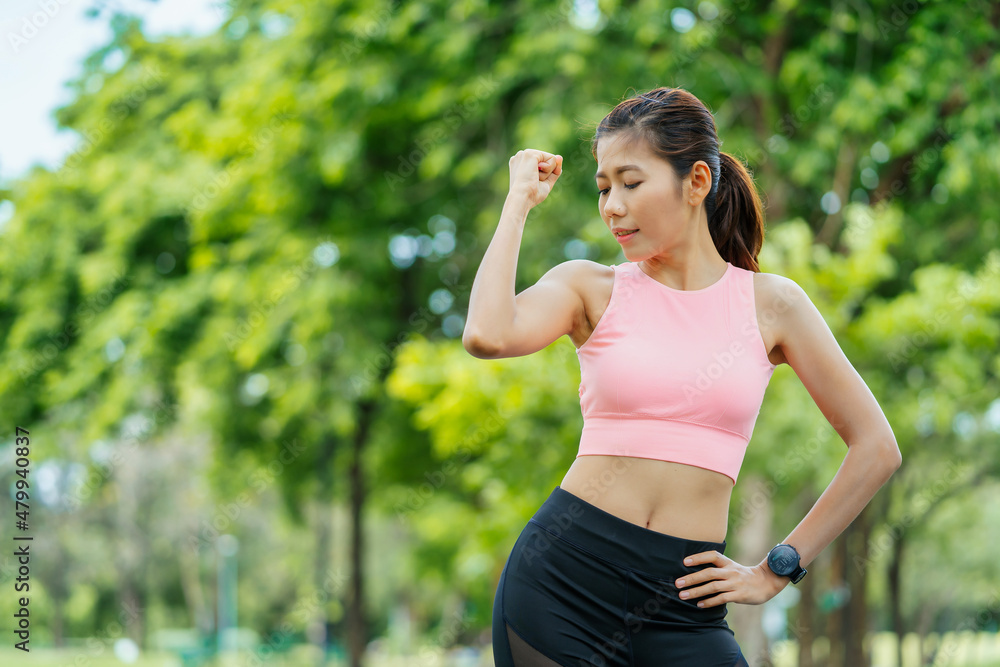 asian young woman stretching in park, lifestyle and health concept. asian young woman stretching in park, lifestyle and health concept.