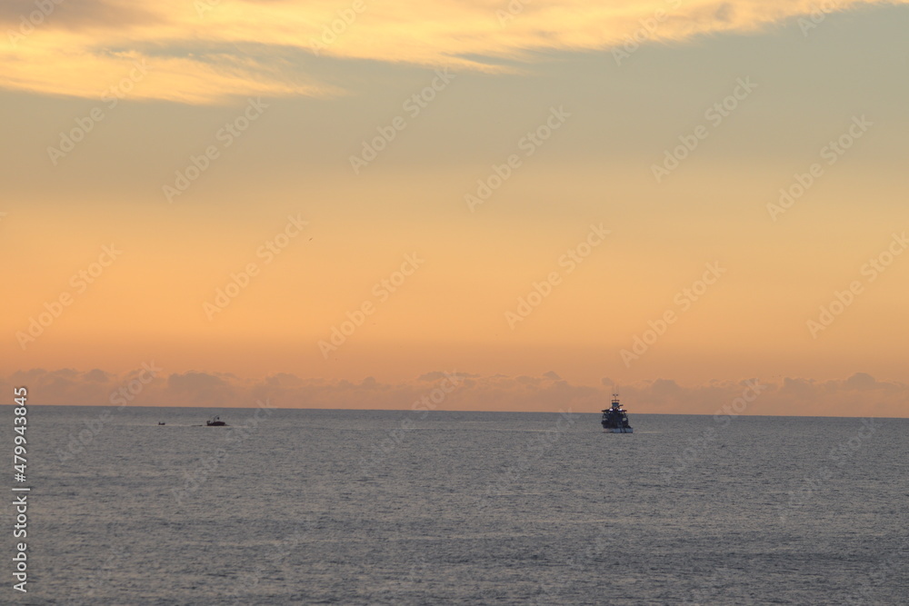 Sunrise with a ship on the most beautiful beaches in Brazil Sunrise with a ship on the most beautiful beaches in Brazil