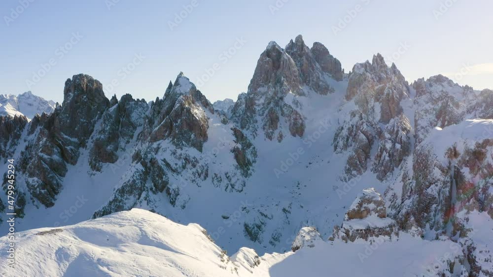 Amazing aerial view of mountains in winter with snow and in a sunny day. Amazing aerial view of mountains in winter with snow and in a sunny day.
