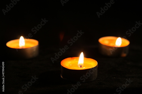 three candles in the dark