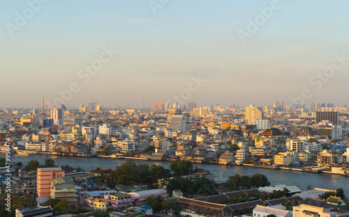 Aerial view of Bangkok Downtown Skyline, Thailand. Financial district and business centers in smart urban city in Asia. Skyscraper and high-rise buildings at sunset.