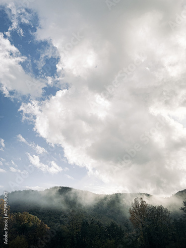 time clouds over the mountains