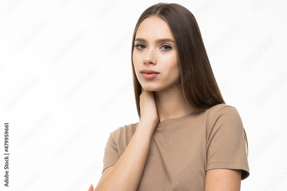 Beauty portrait of a smiling woman looking at camera on a white background Beauty portrait of a smiling woman looking at camera on a white background